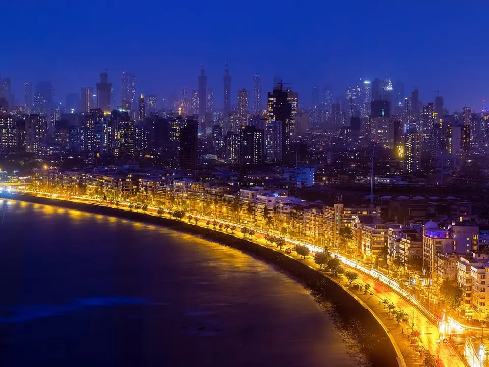 The lit curve of Marine Drive along the bay in South Mumbai at dusk