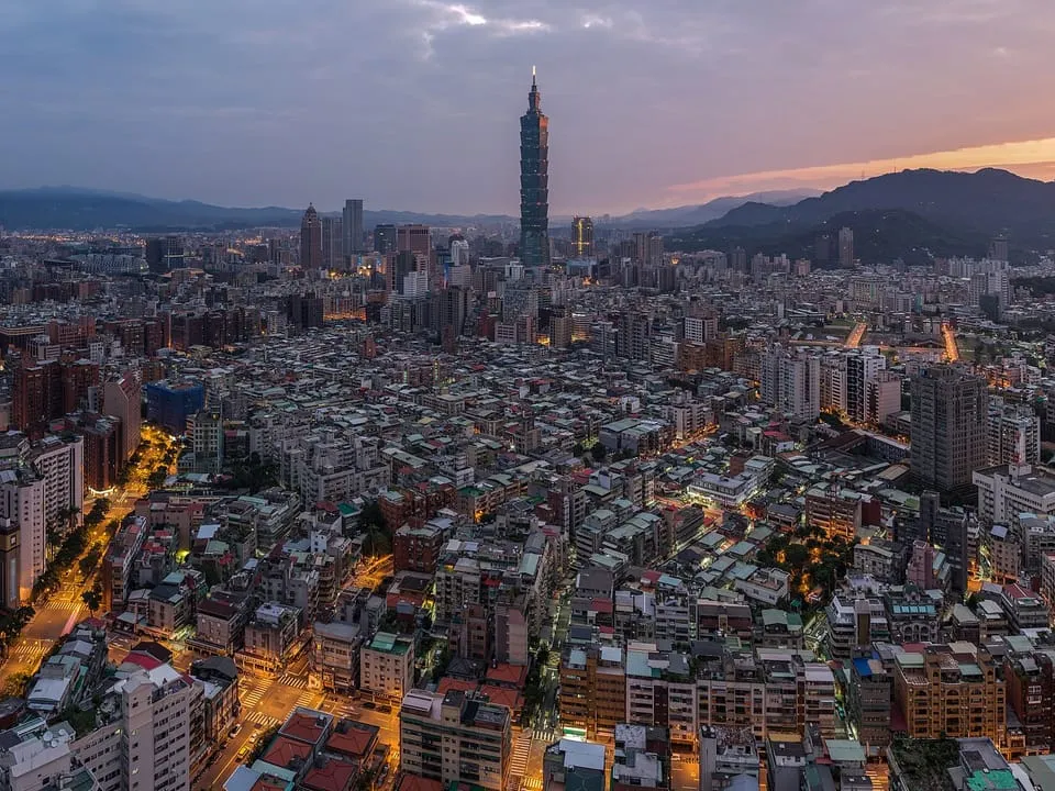 Taipei at sunrise, with Taipei 101 rising above the city